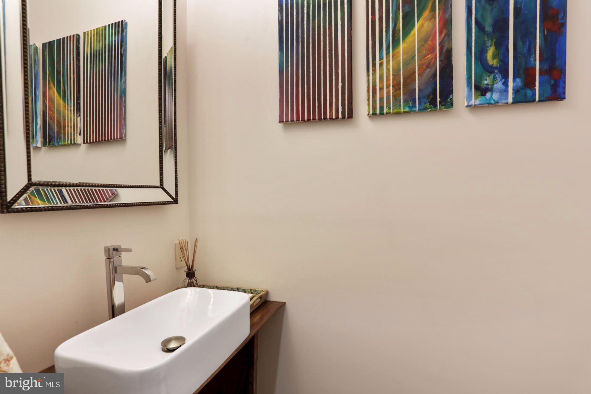 203 Tapawingo Road Southeast Vienna, VA 22180 - Photo 14 of 33 Convenient Powder Room at main level.
