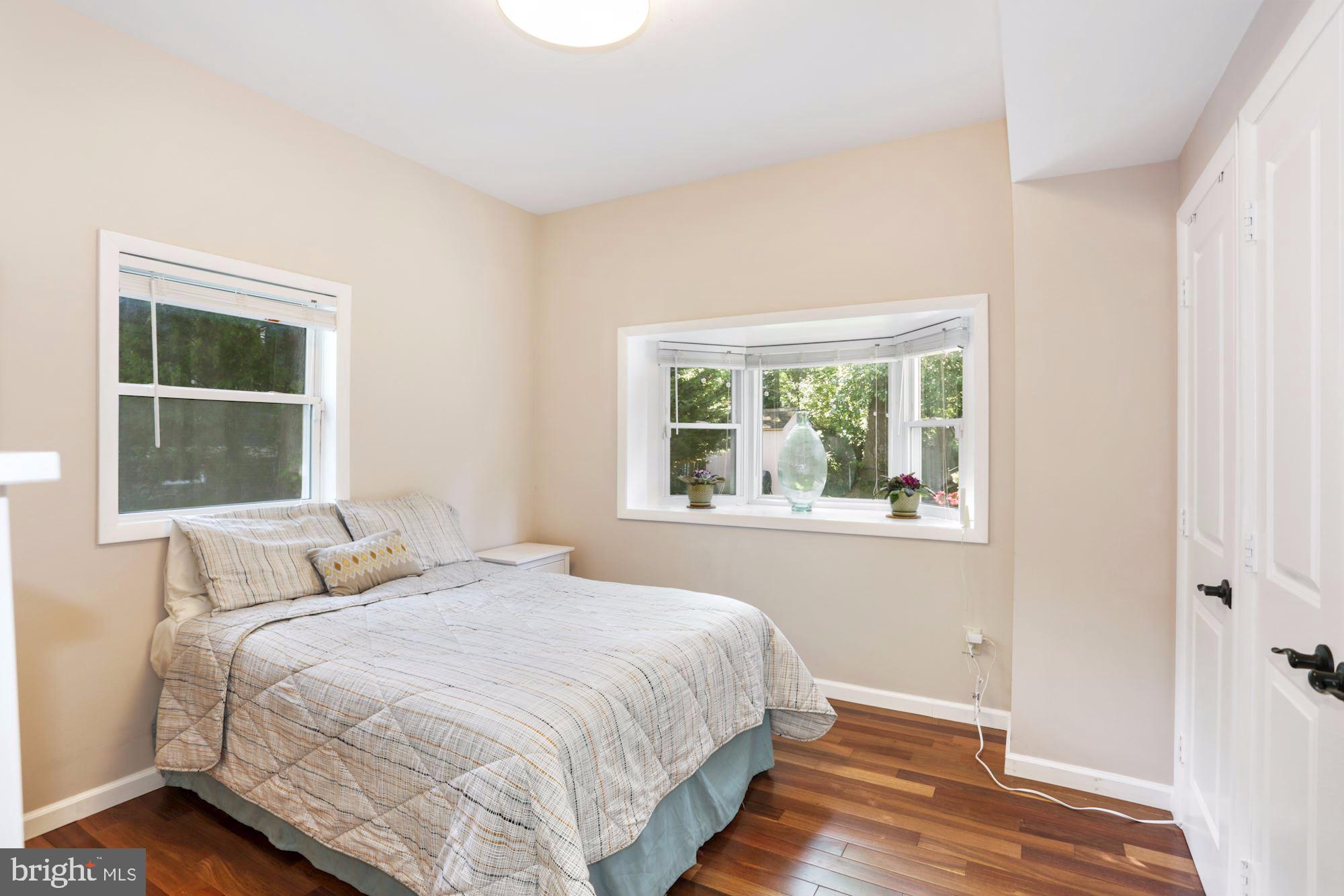 203 Tapawingo Road Southeast Vienna, VA 22180 - Photo 15 of 33 Main Level bedroom with Bay window and Bath.