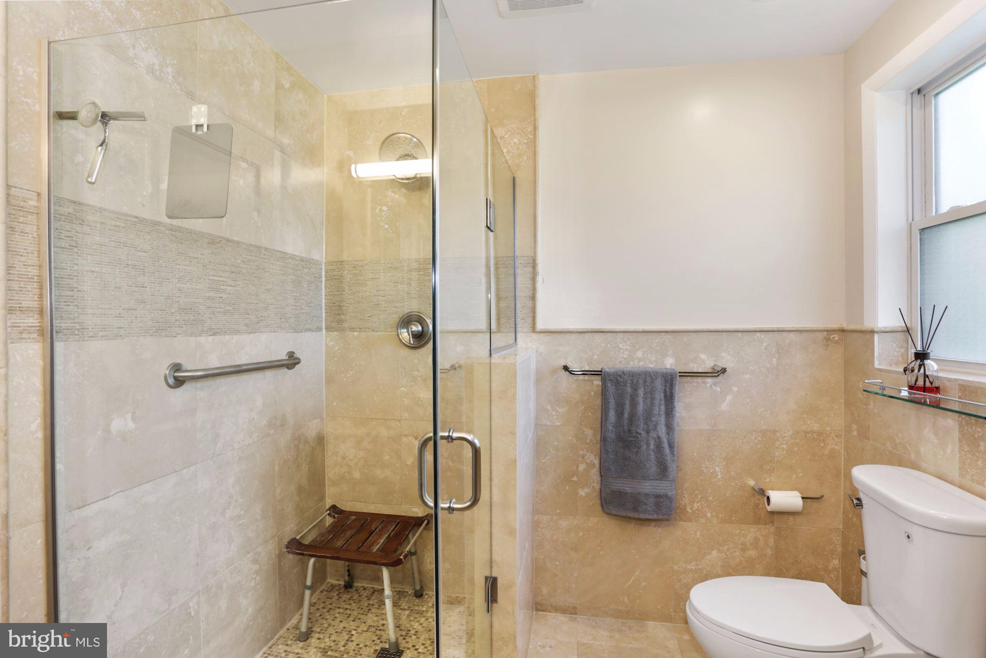 203 Tapawingo Road Southeast Vienna, VA 22180 - Photo 20 of 33 Travertine Marble in the Master's Bath,