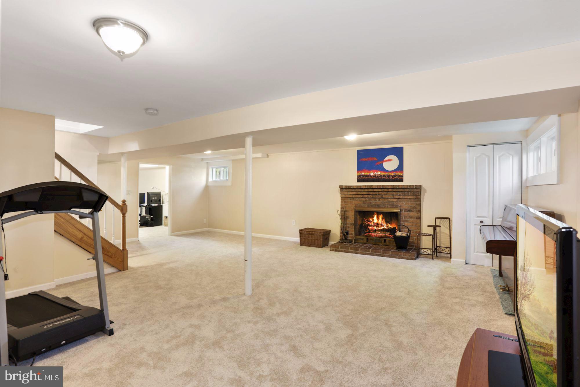 203 Tapawingo Road Southeast Vienna, VA 22180 - Photo 28 of 33 Basement with Hardwood Fireplace.