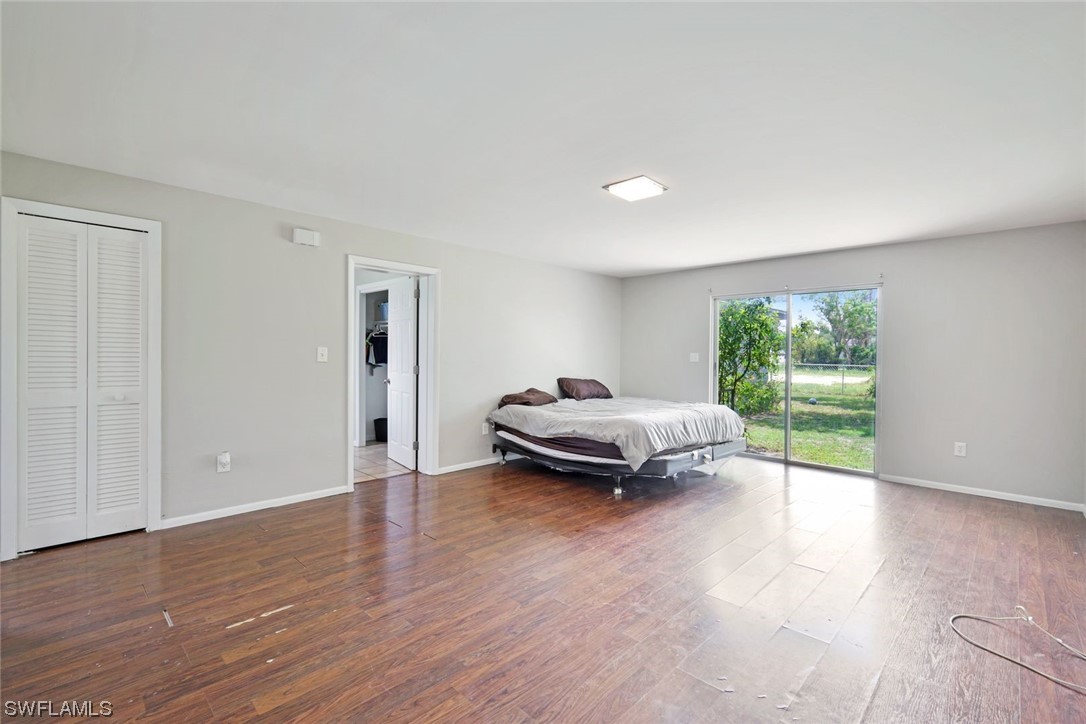 2968 Sunset Road Fort Myers, FL 33901 - Photo 12 of 23 a bedroom with a bed and a window