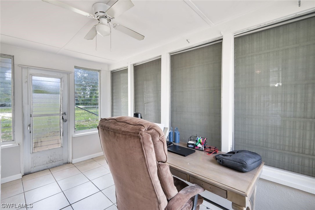 2968 Sunset Road Fort Myers, FL 33901 - Photo 19 of 23 a dining room with furniture and window