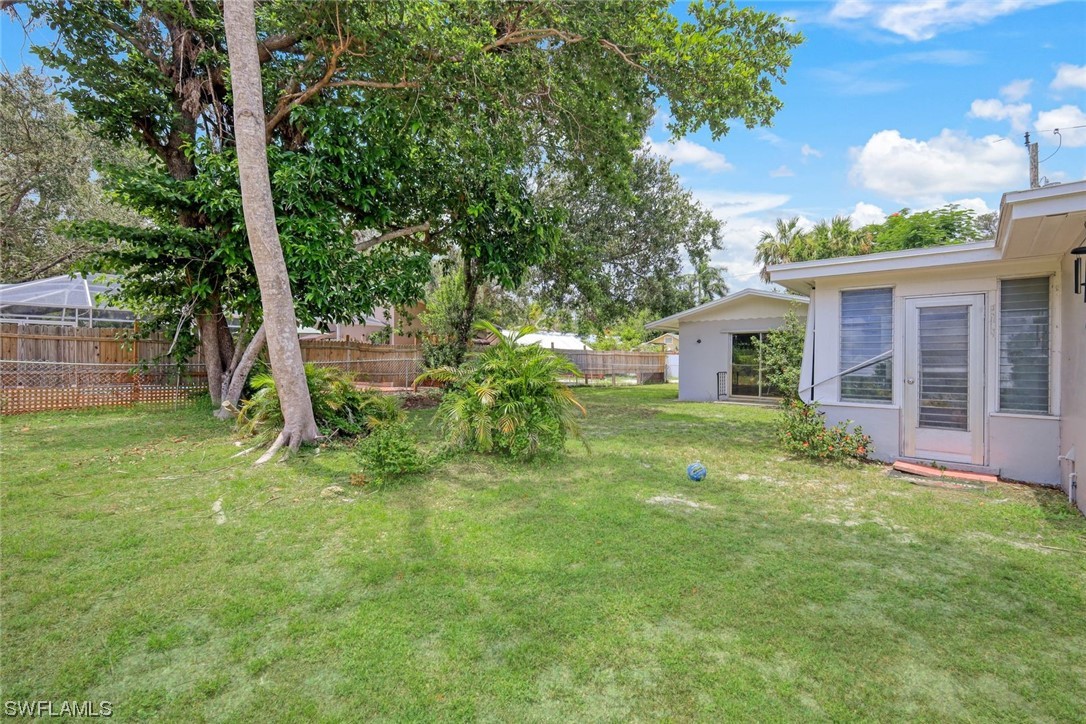 2968 Sunset Road Fort Myers, FL 33901 - Photo 21 of 23 front view of a house with a yard