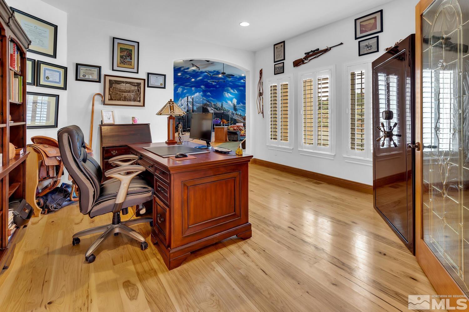 3100 Yellow Tail Road Reno, NV 89510 - Photo 16 of 40 a view of a livingroom with furniture and a flat screen tv