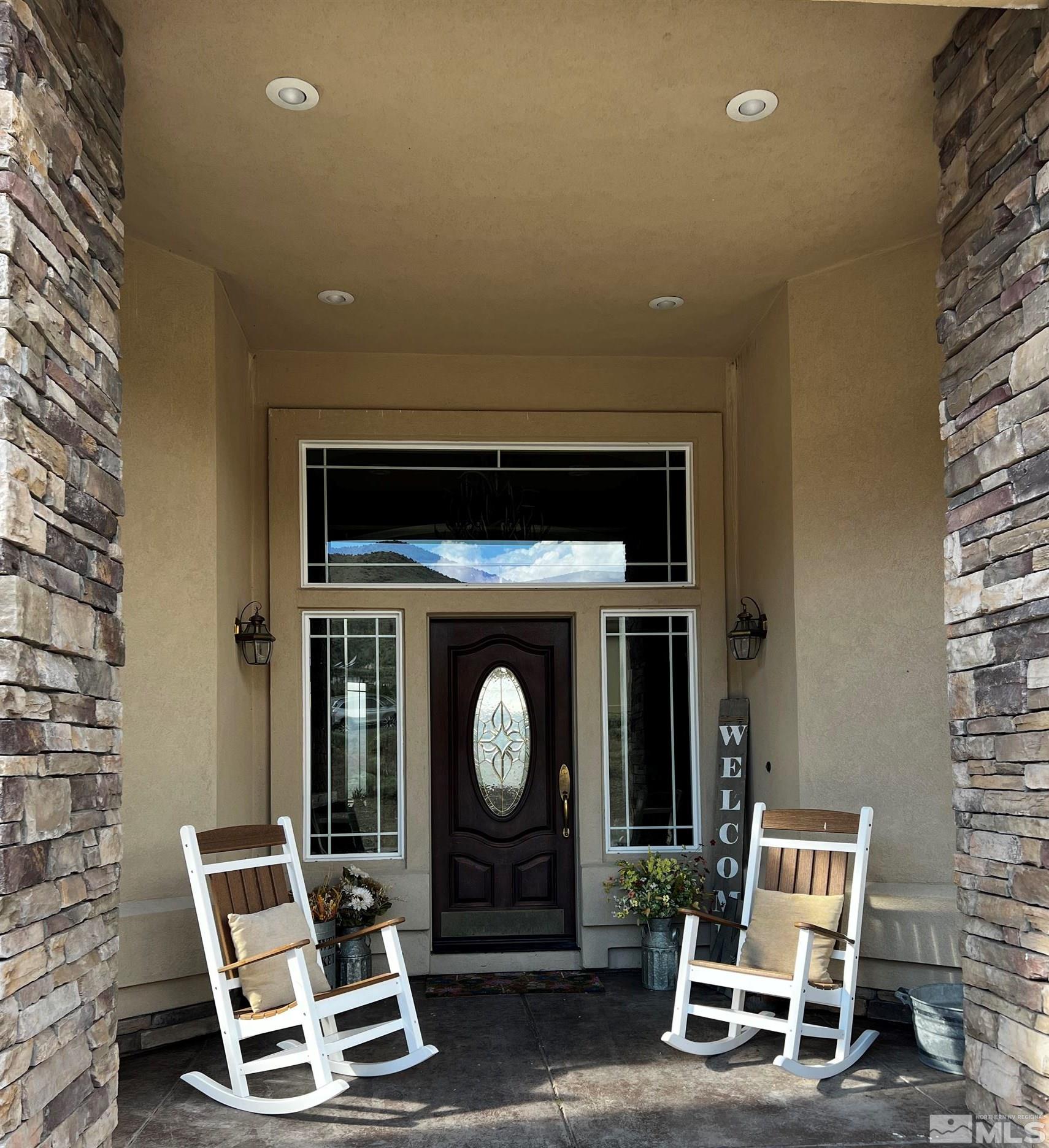3100 Yellow Tail Road Reno, NV 89510 - Photo 2 of 40 a living room with furniture and a fireplace