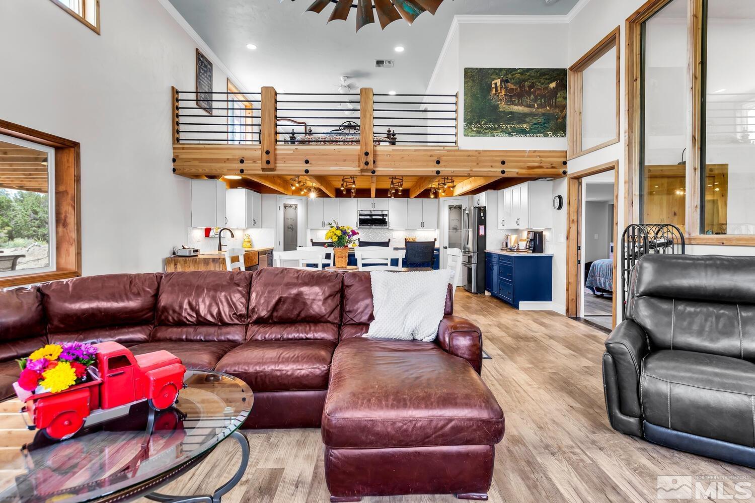 3100 Yellow Tail Road Reno, NV 89510 - Photo 28 of 40 a living room with furniture a flat screen tv and a window