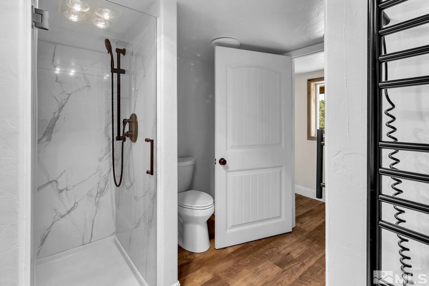 3100 Yellow Tail Road Reno, NV 89510 - Photo 32 of 40 a bathroom with a shower and toilet