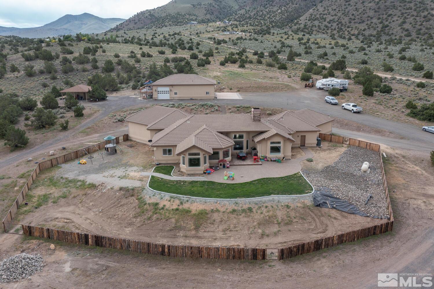 3100 Yellow Tail Road Reno, NV 89510 - Photo 38 of 40 a view of a house with a yard