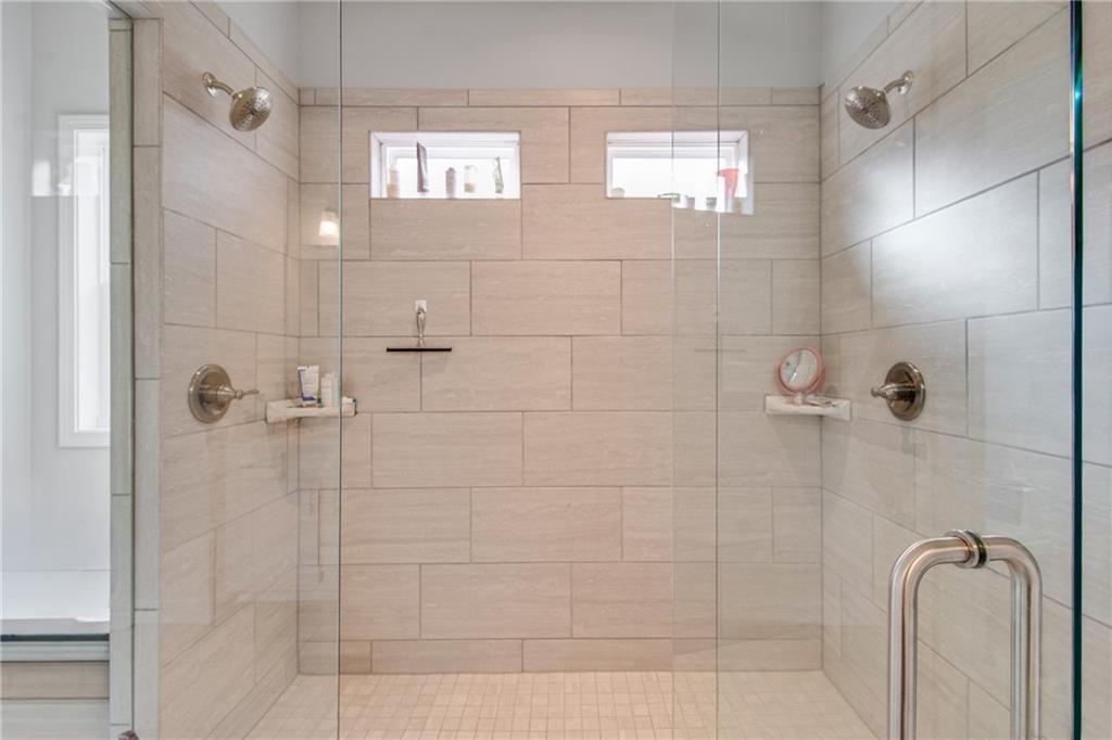 338 Ryston Way Grayson, GA 30017 - Photo 28 of 61 a bathroom with a shower