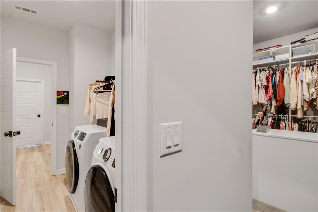338 Ryston Way Grayson, GA 30017 - Photo 30 of 61 a view of walk in closet with clothes and shoes