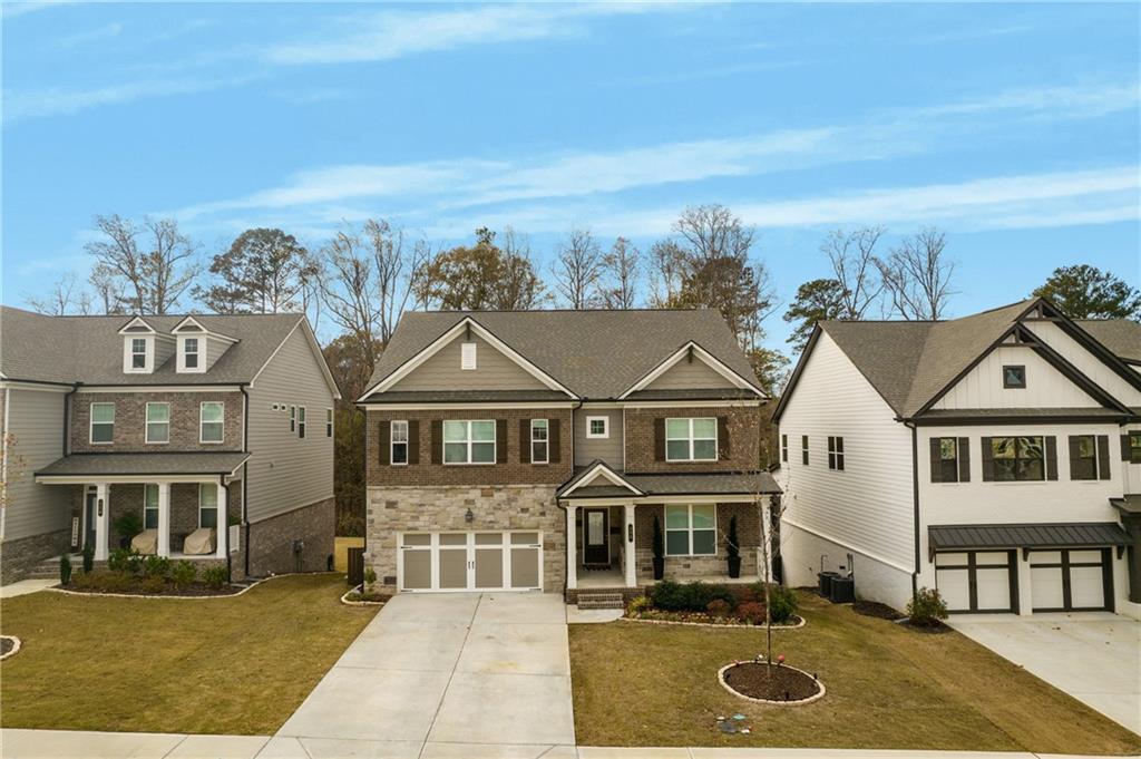 338 Ryston Way Grayson, GA 30017 - Photo 3 of 61 an aerial view of a house