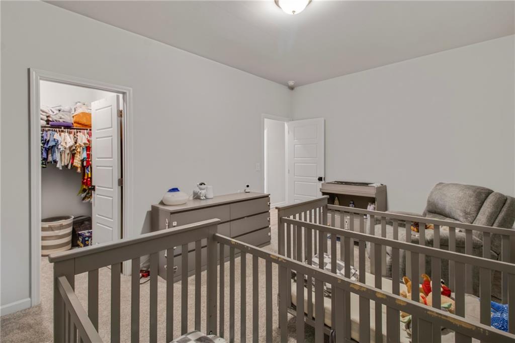 338 Ryston Way Grayson, GA 30017 - Photo 32 of 61 a view of a hallway with workspace