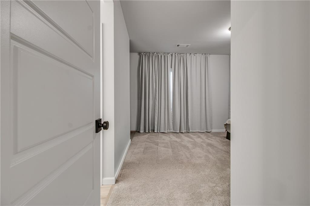 338 Ryston Way Grayson, GA 30017 - Photo 39 of 61 a view of a room with a white door