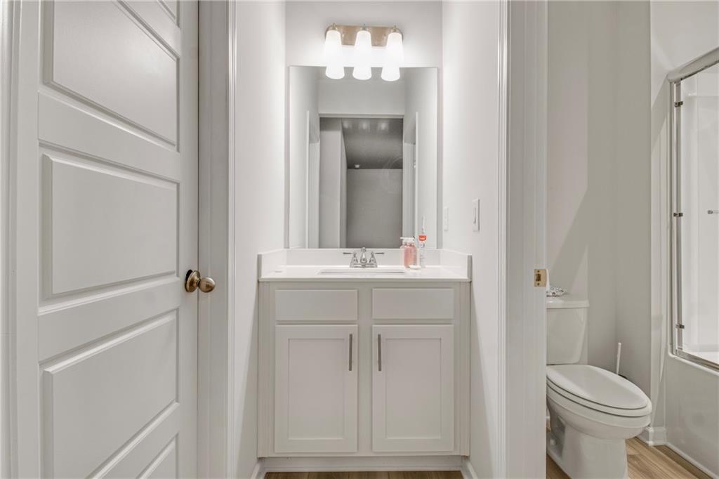 338 Ryston Way Grayson, GA 30017 - Photo 42 of 61 a bathroom with a sink vanity mirror and toilet