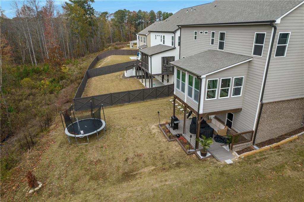 338 Ryston Way Grayson, GA 30017 - Photo 54 of 61 an aerial view of a house with backyard space