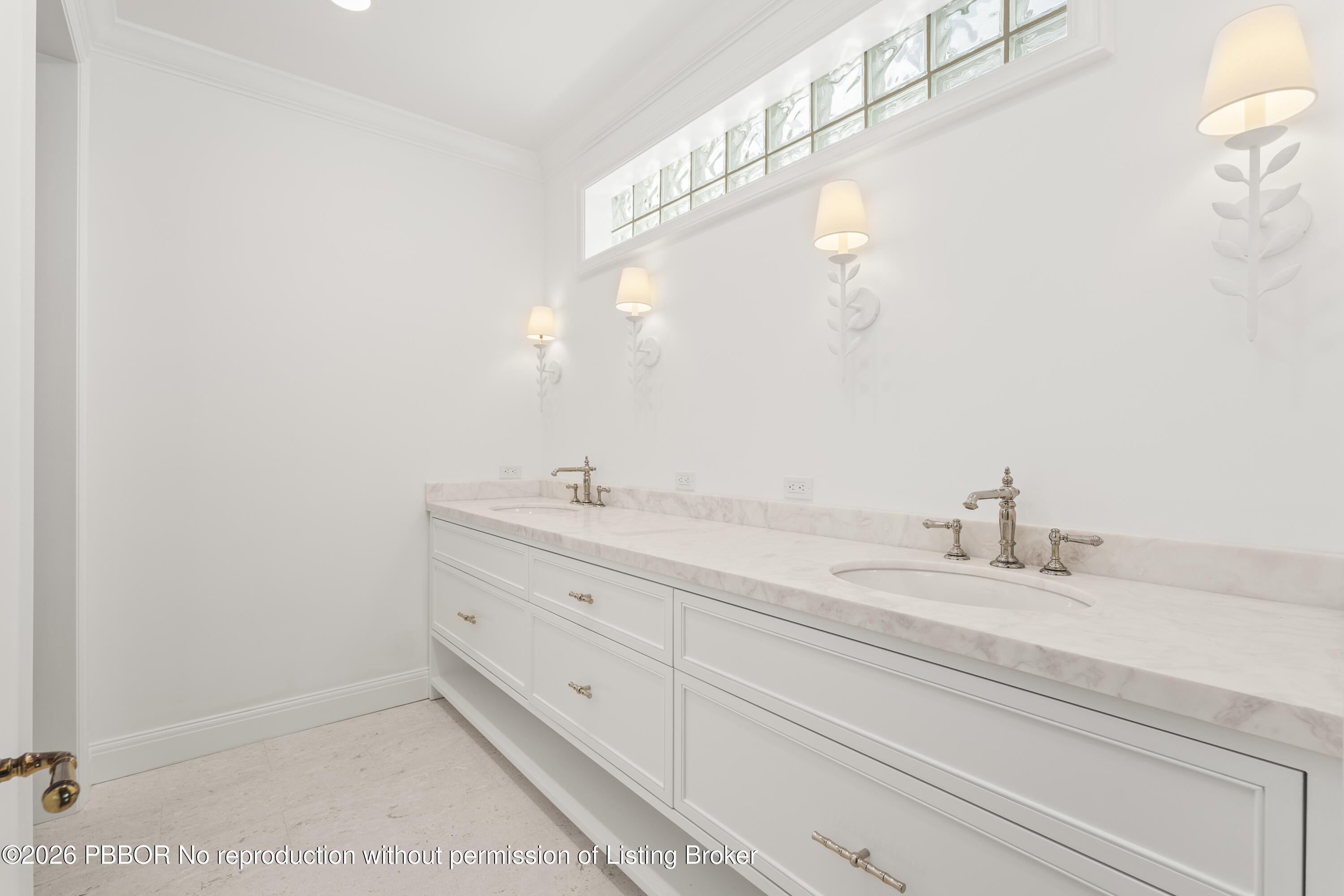 156 Dolphin Road Palm Beach, FL 33480 - Photo 13 of 21 a bathroom with a double vanity sink and a mirror