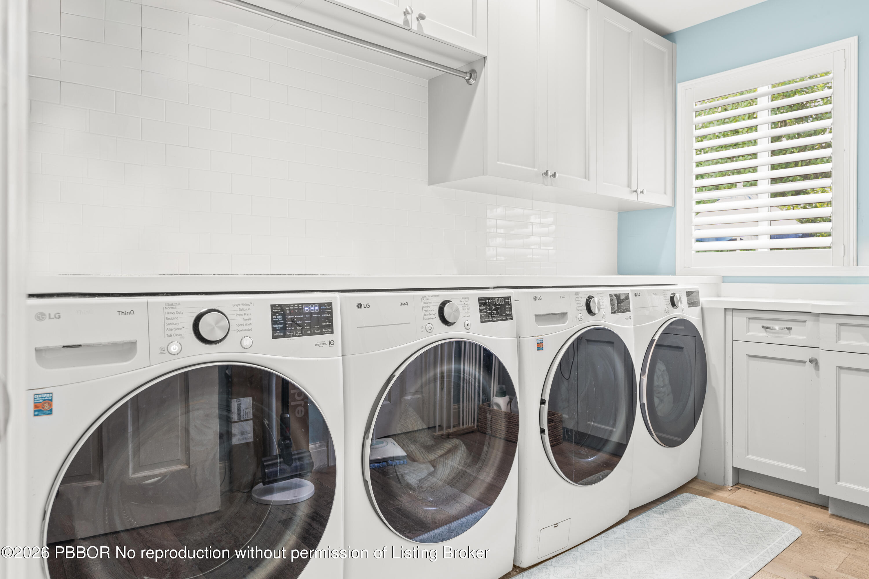 156 Dolphin Road Palm Beach, FL 33480 - Photo 14 of 21 a utility room with dryer and washer
