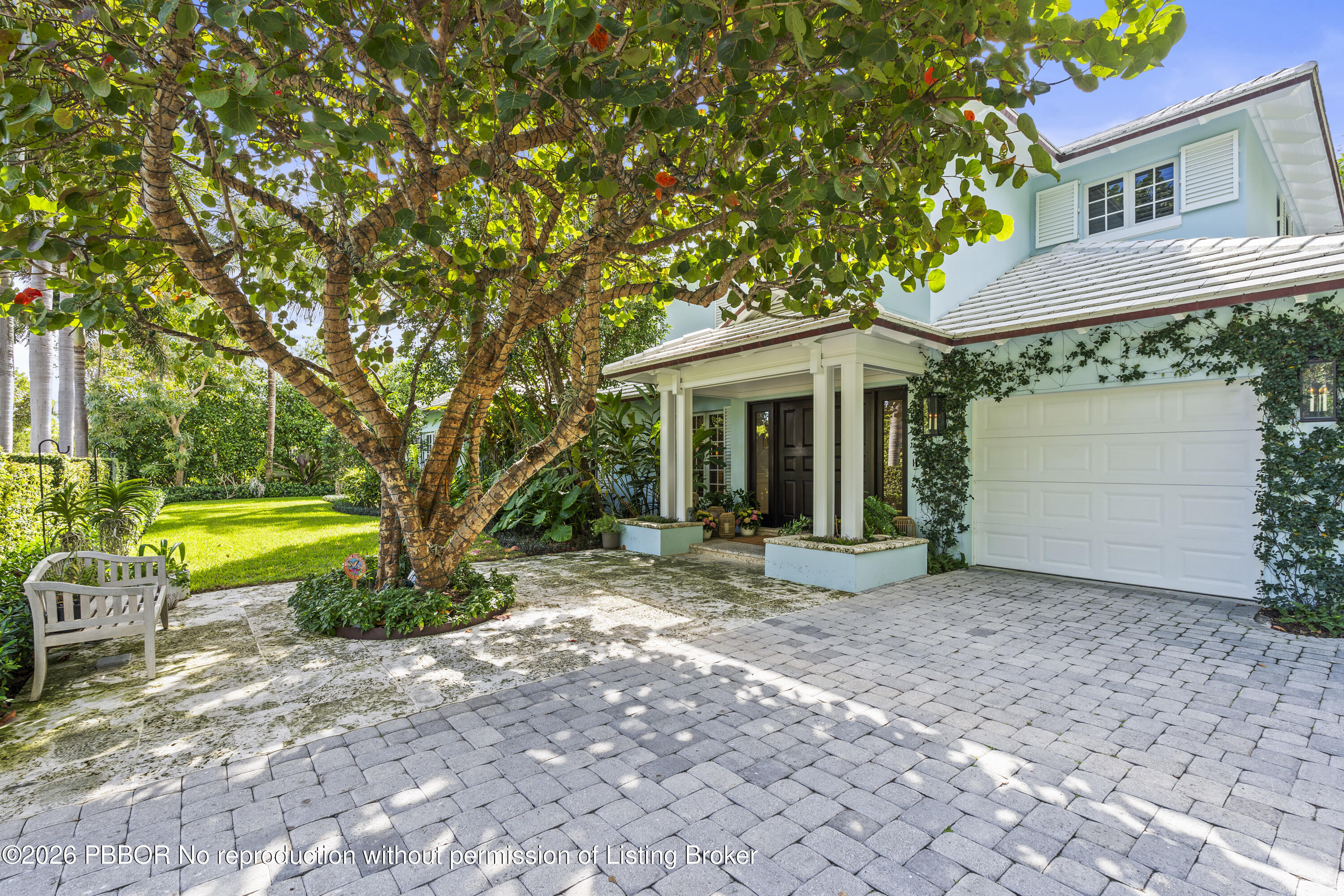 156 Dolphin Road Palm Beach, FL 33480 - Photo 2 of 21 a view of a house with a backyard