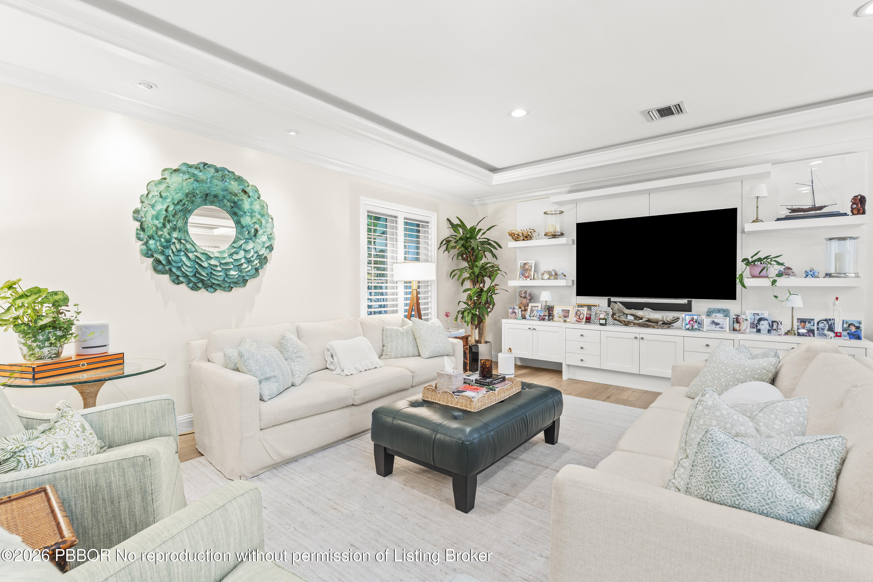 156 Dolphin Road Palm Beach, FL 33480 - Photo 8 of 21 a living room with furniture and a flat screen tv