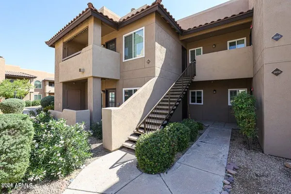 a front view of a house with windows