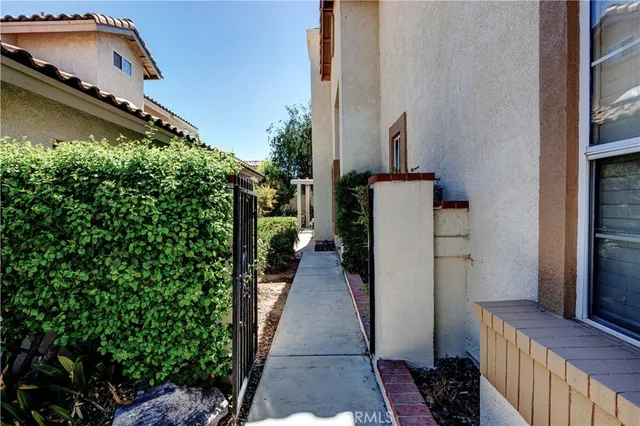 a view of a livingroom with an empty space and a fireplace
