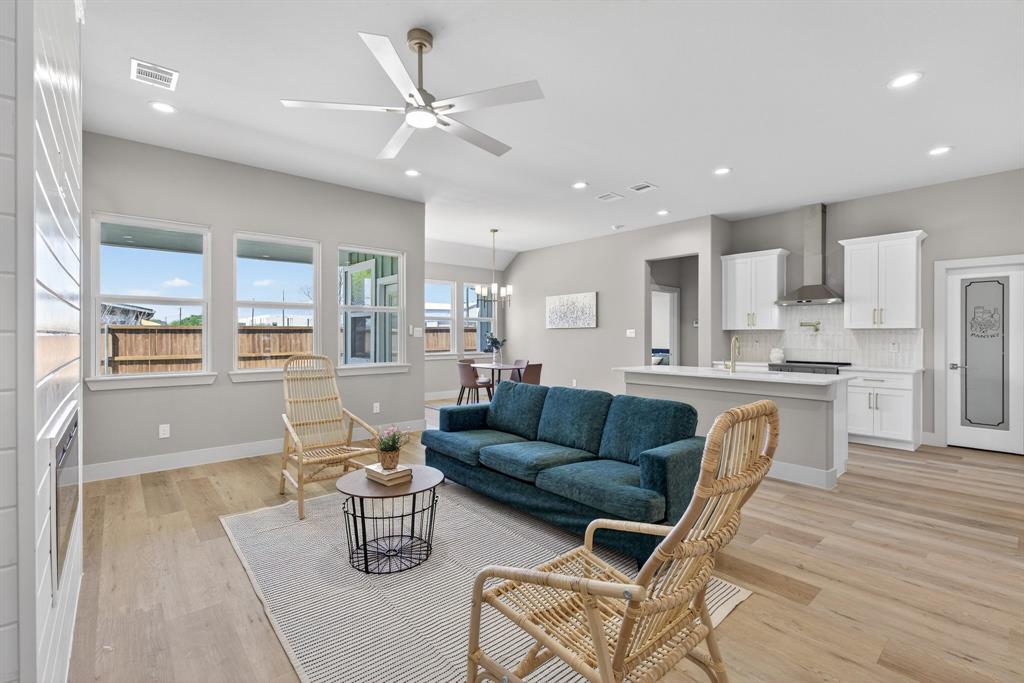 900 Cope Street Mansfield, TX 76065 - Photo 11 of 37 a living room with stainless steel appliances furniture and a kitchen view