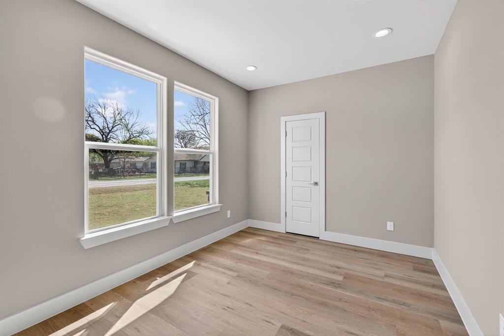 900 Cope Street Mansfield, TX 76065 - Photo 18 of 37 a view of an empty room with a window