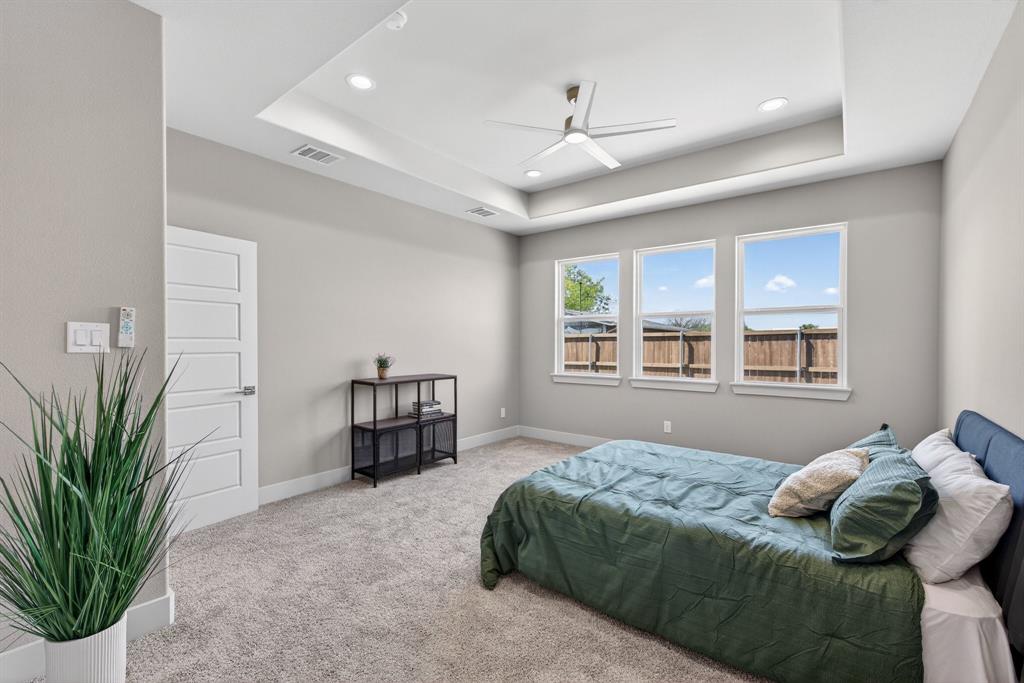 900 Cope Street Mansfield, TX 76065 - Photo 19 of 37 a bedroom with a bed furniture and a window