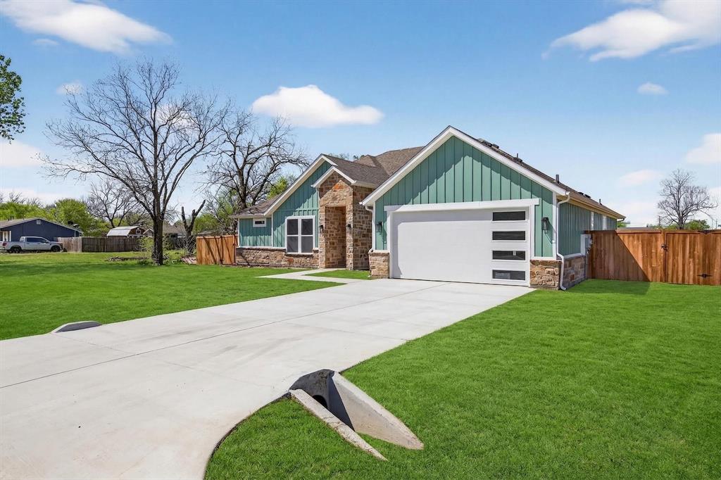 900 Cope Street Mansfield, TX 76065 - Photo 2 of 37 a front view of house with yard and green space