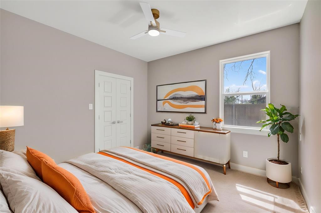 900 Cope Street Mansfield, TX 76065 - Photo 28 of 37 a bedroom with a bed and a potted plant