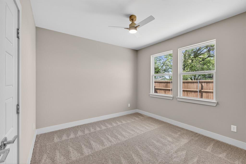 900 Cope Street Mansfield, TX 76065 - Photo 34 of 37 an empty room with a window and a fan
