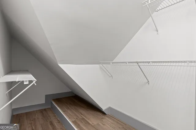 a view of a room with racks on the wall