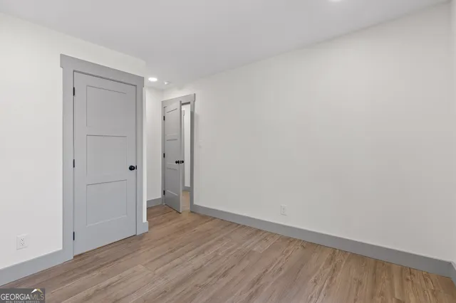 a view of a backyard with table and chairs