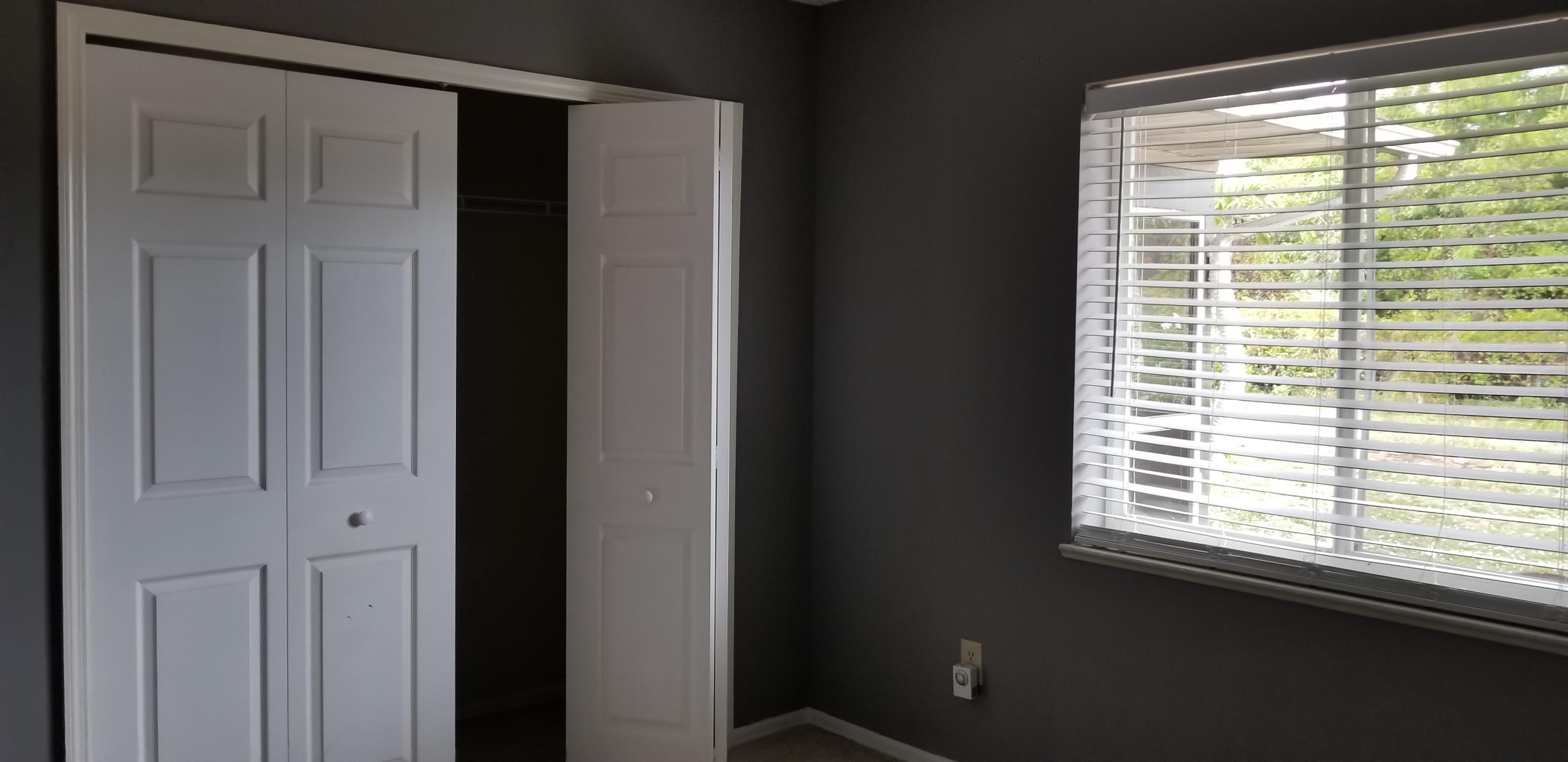 801 Southwest Andrew Road Port St. Lucie, FL 34953 - Photo 8 of 16 a view of a window in an empty room