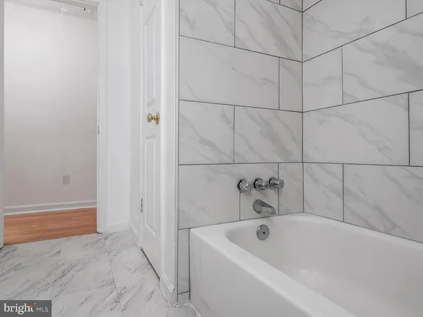 a bathroom with a tub