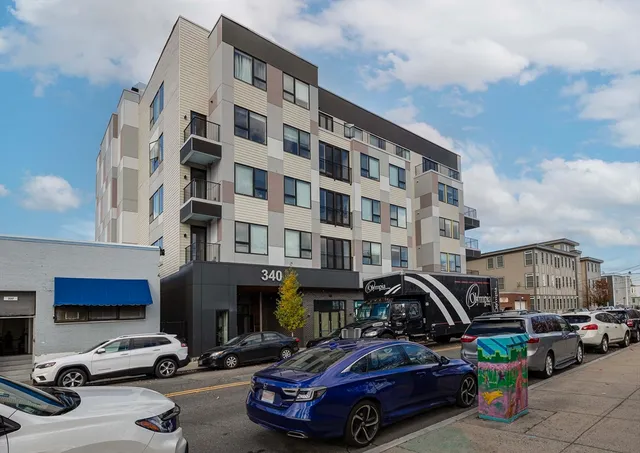 a car parked in front of a building