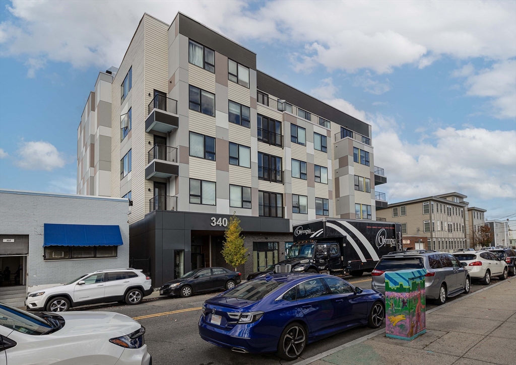 a car parked in front of a building