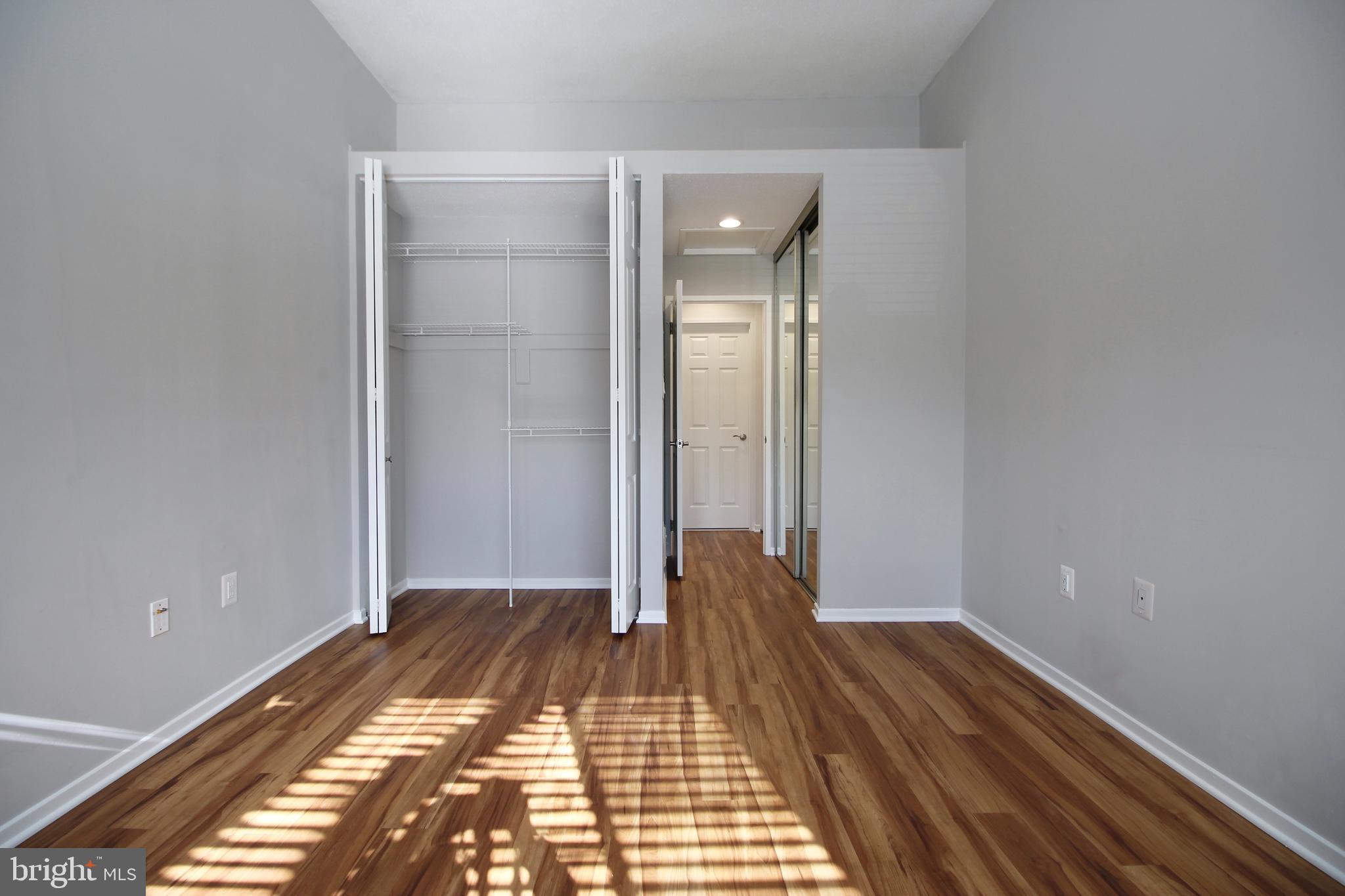 1956A Villaridge Drive, Unit 1956B Reston, VA 20191 - Photo 18 of 24 a view of a room with wooden floor