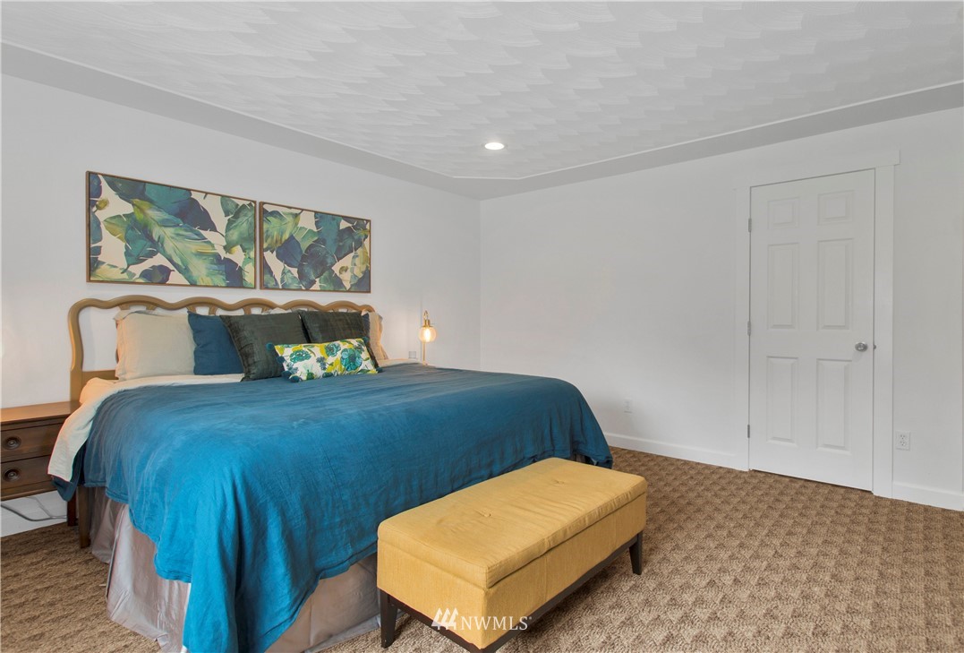 8801 178th Avenue Southwest Rochester, WA 98579 - Photo 29 of 39 a bedroom with a bed and window