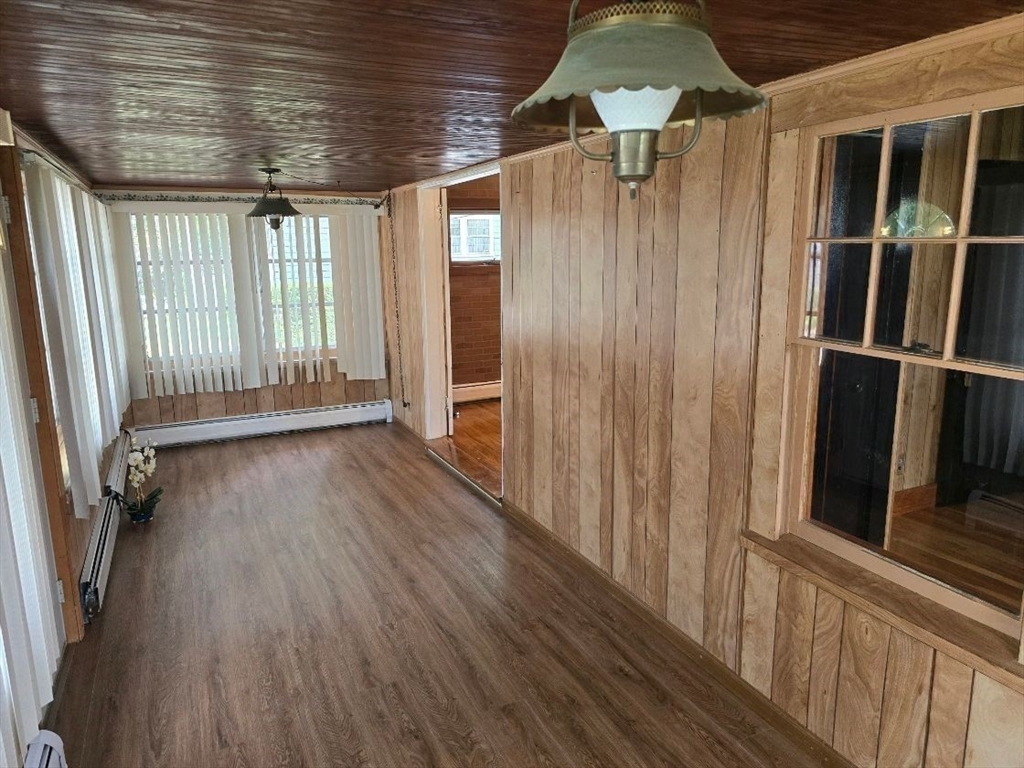 43 Shore Avenue Wareham, MA 02571 - Photo 12 of 32 a view of a hallway with wooden floor and staircase