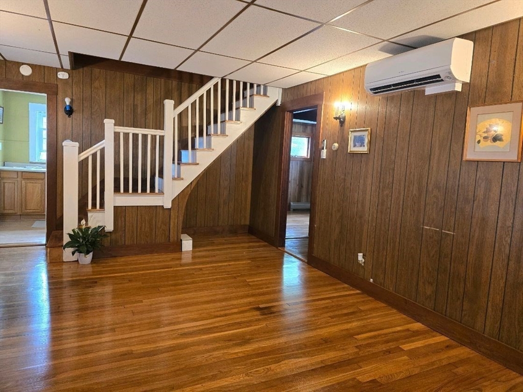 43 Shore Avenue Wareham, MA 02571 - Photo 15 of 32 a view of entryway with stairs and wooden floor