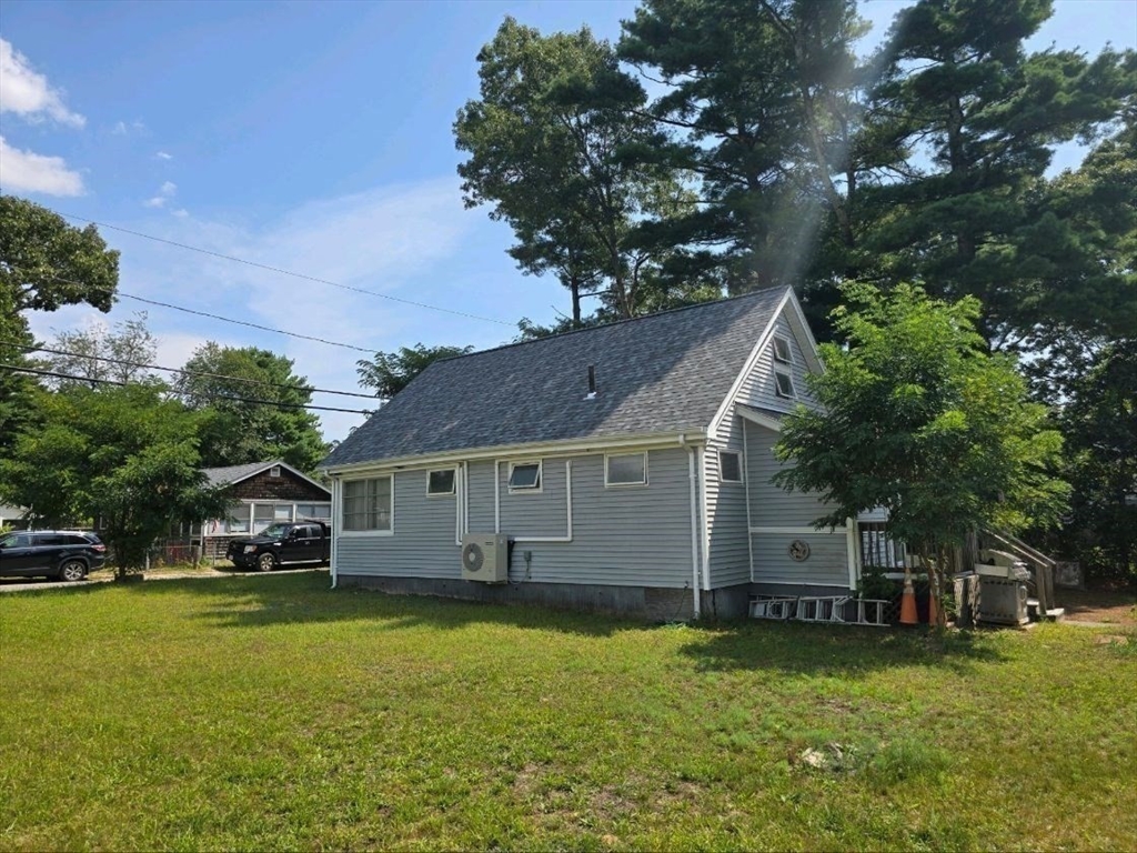43 Shore Avenue Wareham, MA 02571 - Photo 19 of 32 a view of a house with a swimming pool