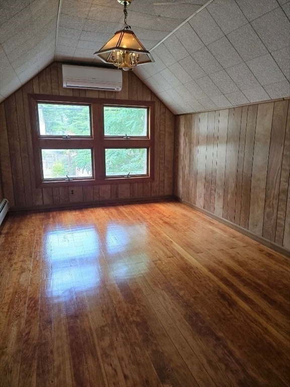 43 Shore Avenue Wareham, MA 02571 - Photo 21 of 32 an empty room with wooden floor chandelier and windows