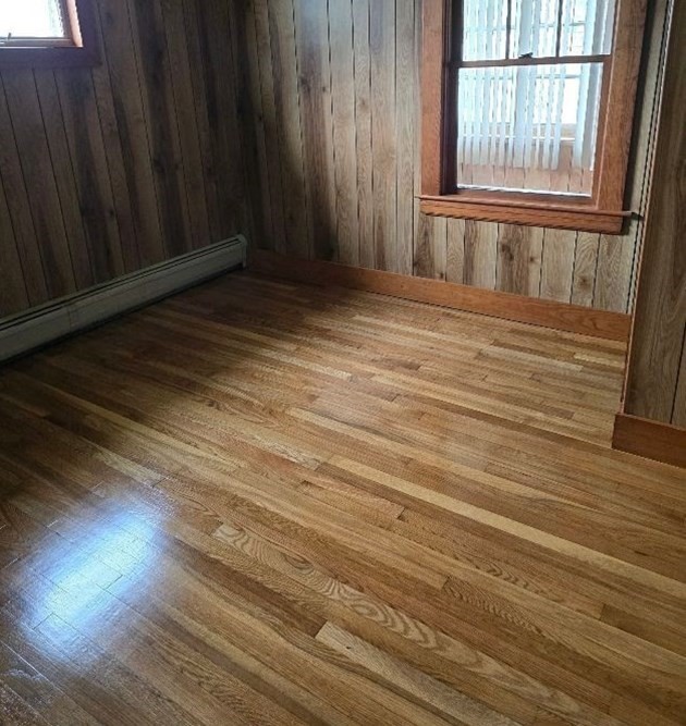 43 Shore Avenue Wareham, MA 02571 - Photo 31 of 32 a view of an empty room with wooden floor and a window