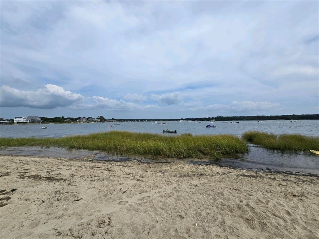 43 Shore Avenue Wareham, MA 02571 - Photo 32 of 32 a view of a lake with a big yard
