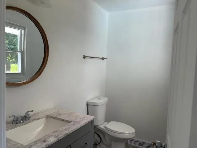 a bathroom with a sink and a toilet