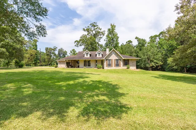 a house view with a garden space