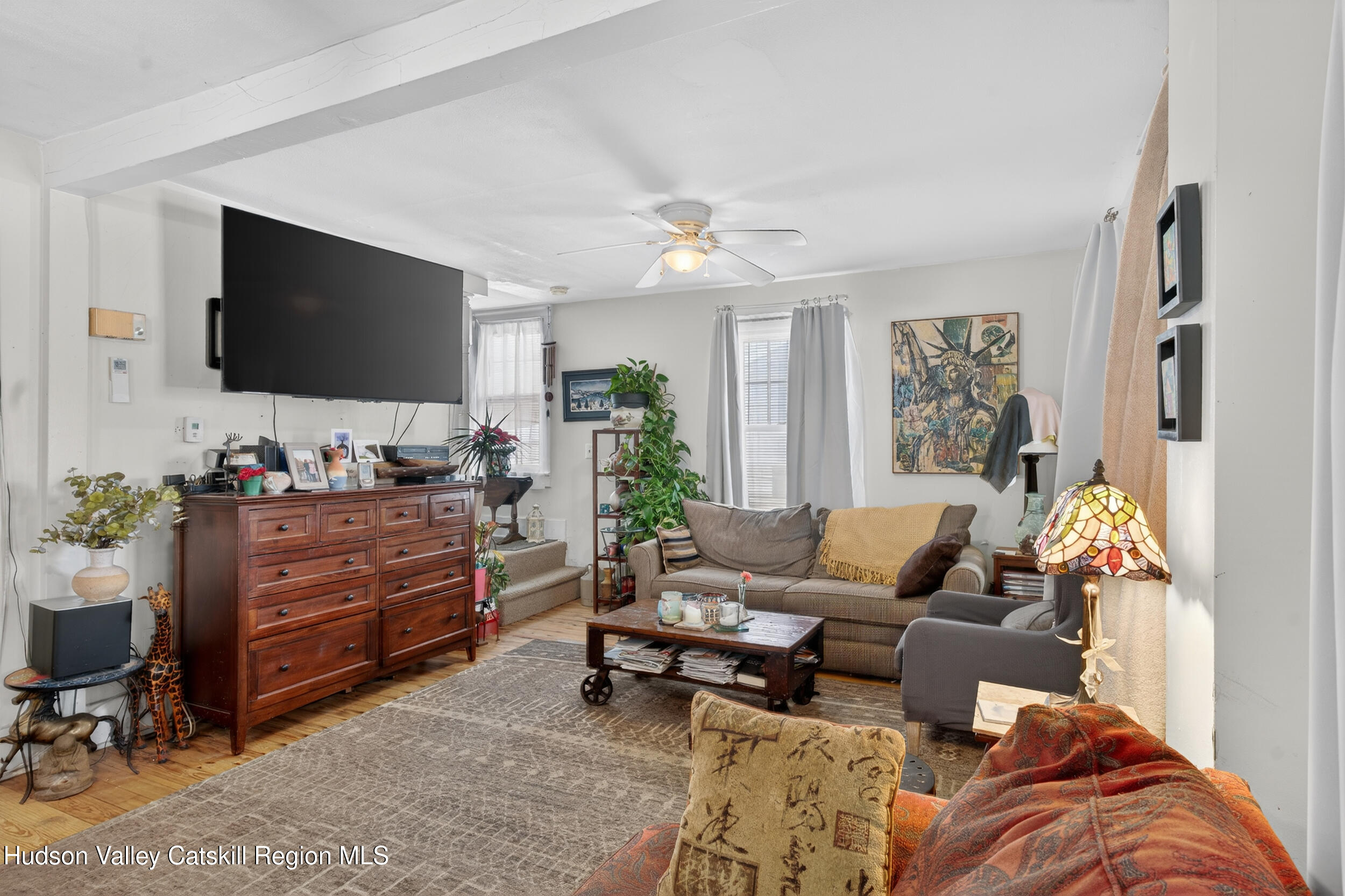 3-5 Dutchtown Road Saugerties, NY 12477 - Photo 13 of 25 a living room with furniture and a flat screen tv