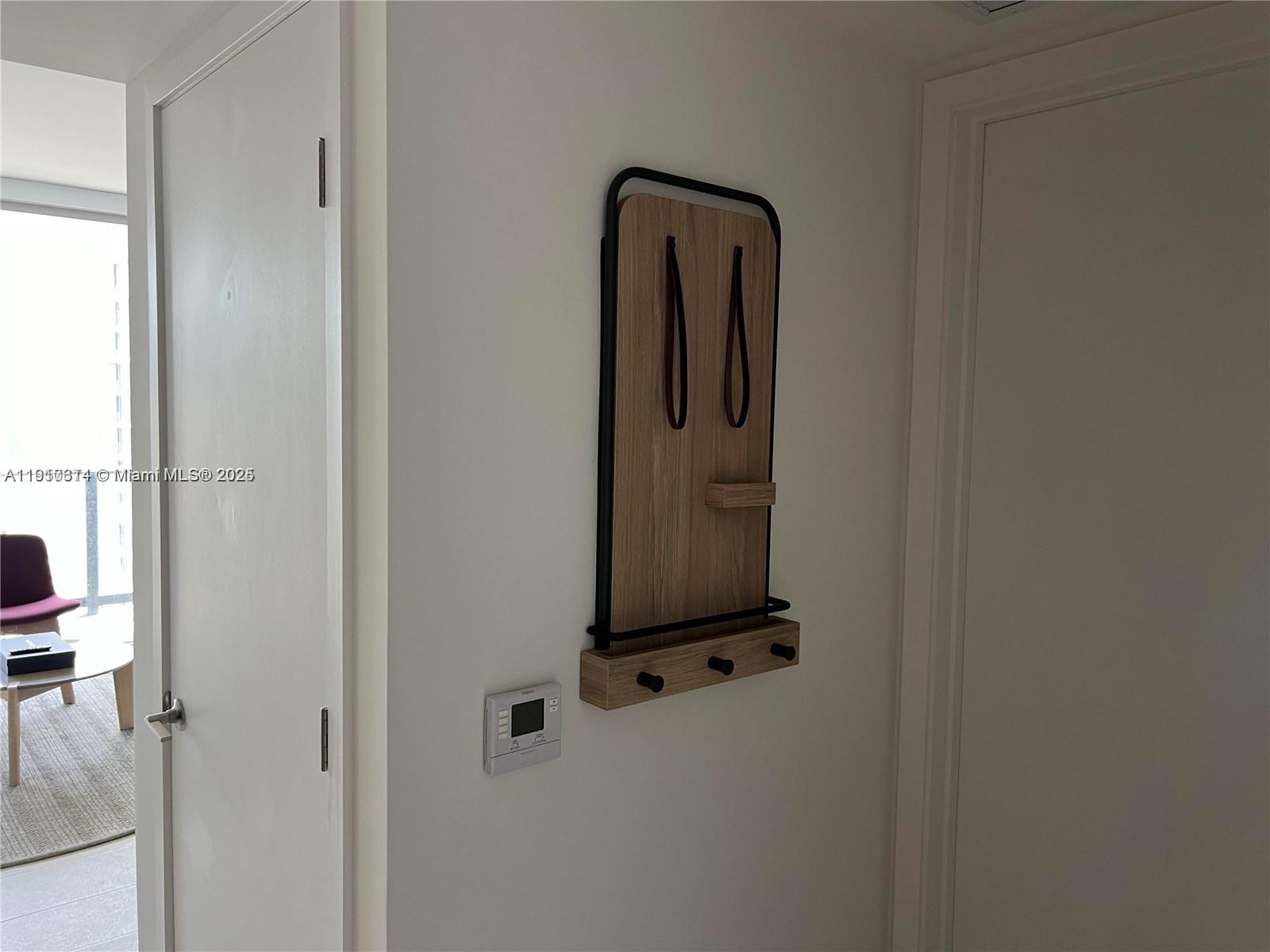 159 Northeast 6th Street, Unit 2807 Miami, FL 33132 - Photo 8 of 13 a view of entryway with a hallway