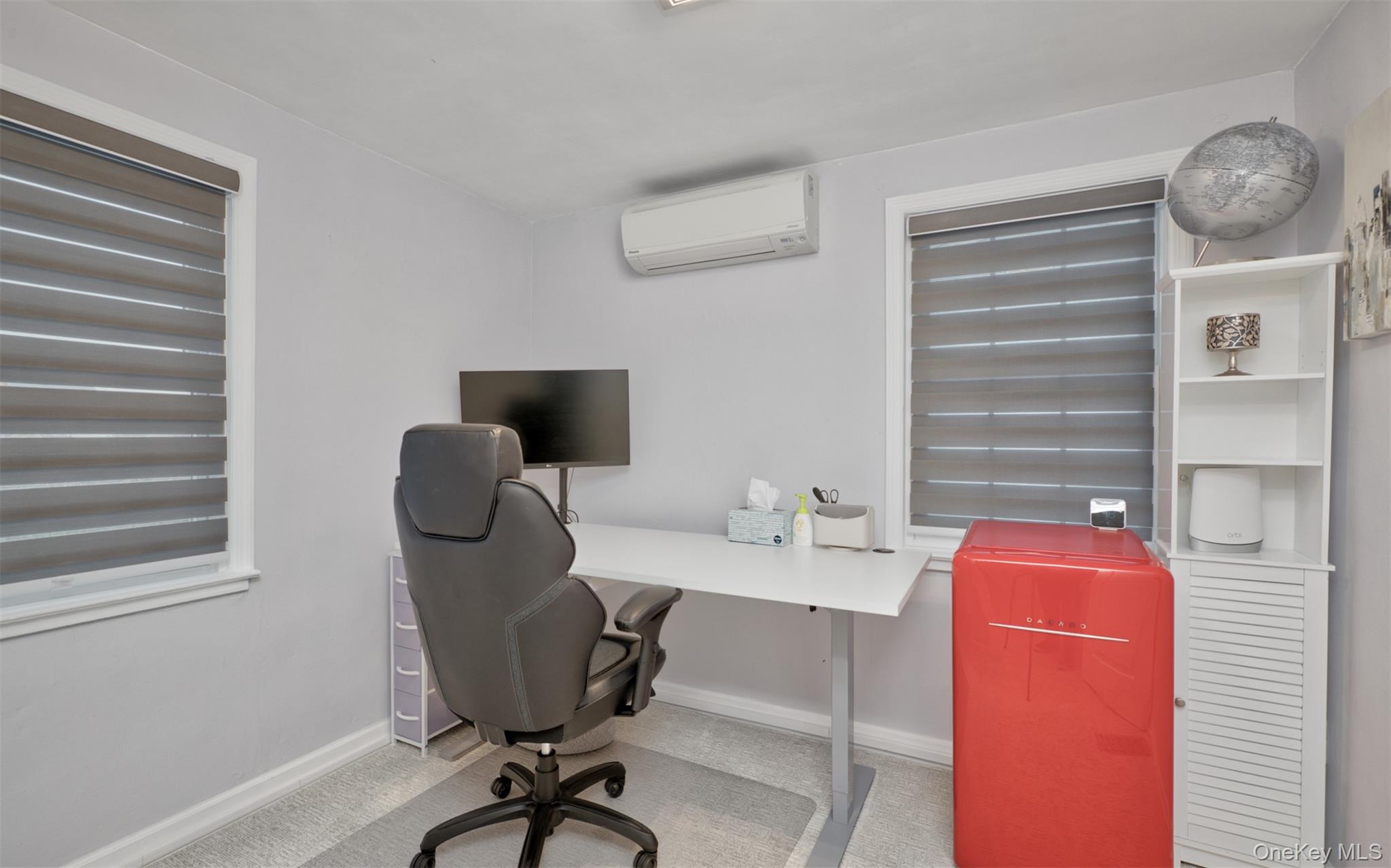 383 White Road Mineola, NY 11501 - Photo 13 of 21 a view of workspace with wooden floor windows